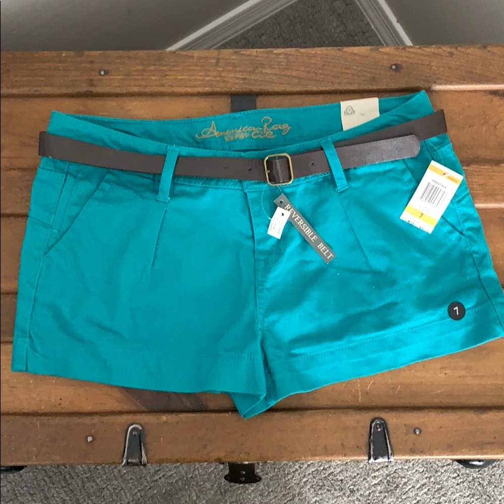 Teal shorts by American Rag with reversible belt 7